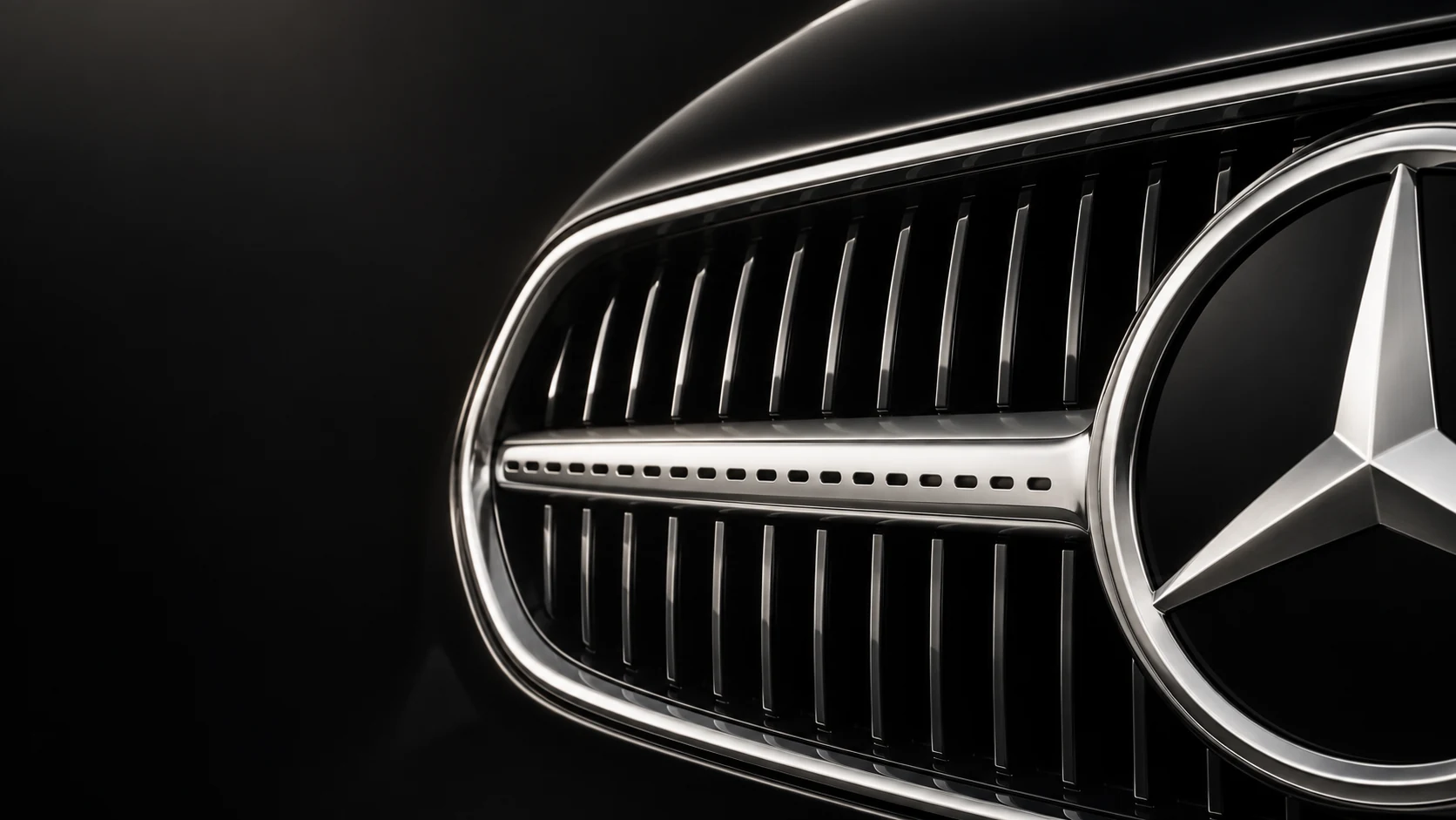 Abstract close-up of a Mercedes-Benz C-Class grille and three-pointed star.